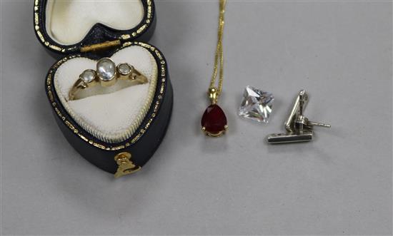 A 9ct gold and gem set ring an 18ct gold gem set pendant on 9ct chain and three other items.
